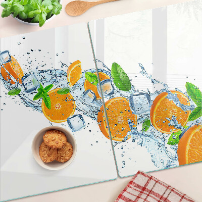 Schneidebrett glas Zitrusfrüchte in Wasser