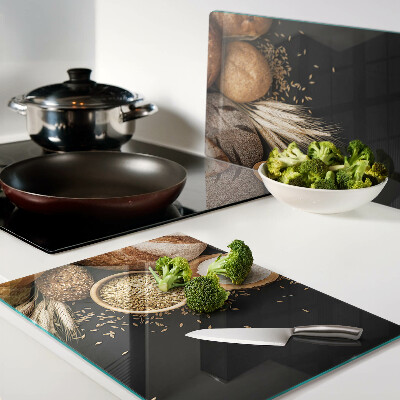 Glas schneidebrett Brot und Getreide