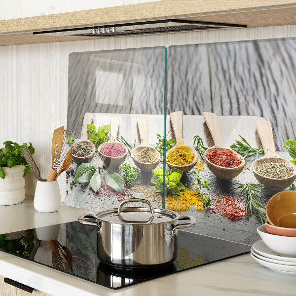 Glas-Schneidebrett mit Motiv aus Gewürzen und Kräutern