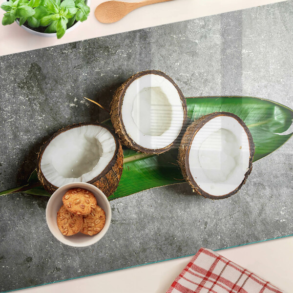 Schneidebrett glas Kokosnuss auf Betongrund