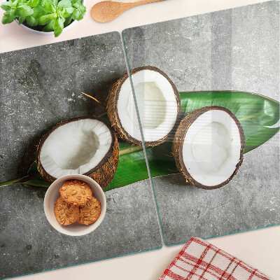 Schneidebrett glas Kokosnuss auf Betongrund