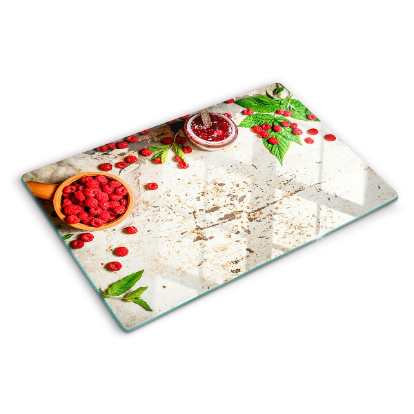 Glas schneidebrett Himbeeren und Blätter