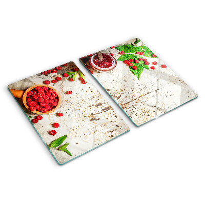 Glas-Schneidebrett mit Motiv aus Himbeeren und Blättern