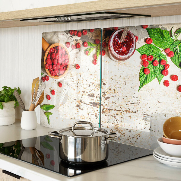 Glas schneidebrett Himbeeren und Blätter