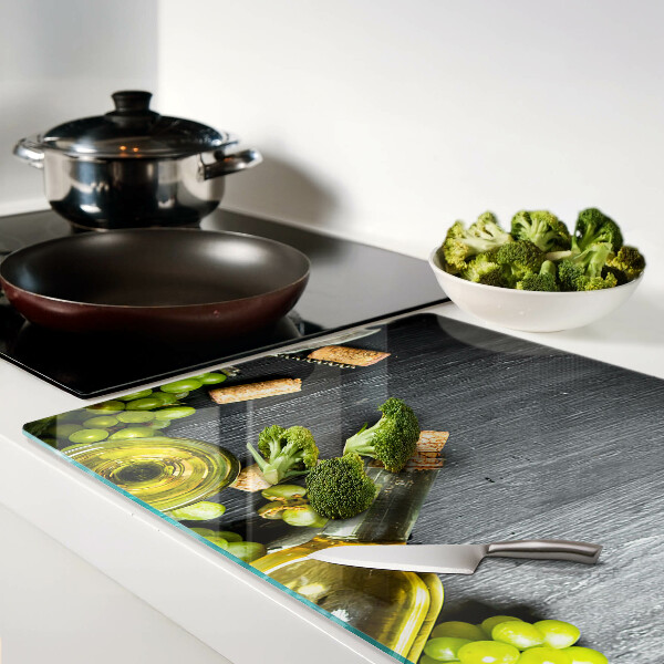 Schneidebrett glas Wein und Trauben