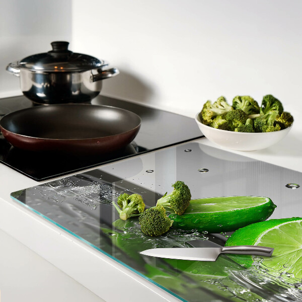 Glas-Schneidebrett mit Motiv von Zitronen im Wasser