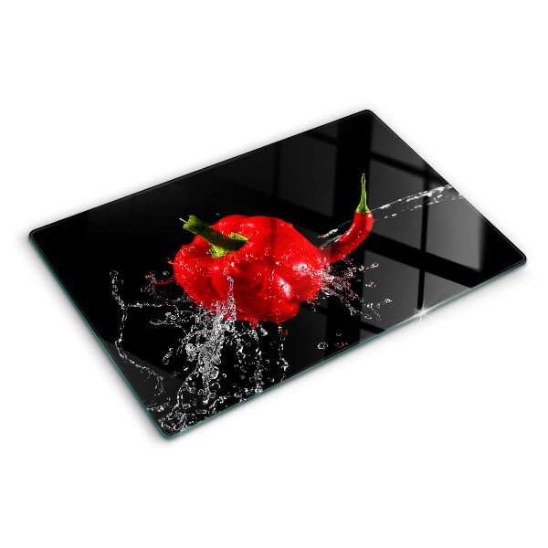 Schneidebrett Rote Paprika in Wasser