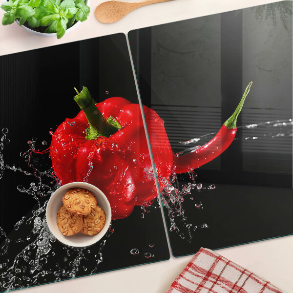 Schneidebrett mit Motiv roter Paprika auf Wasser