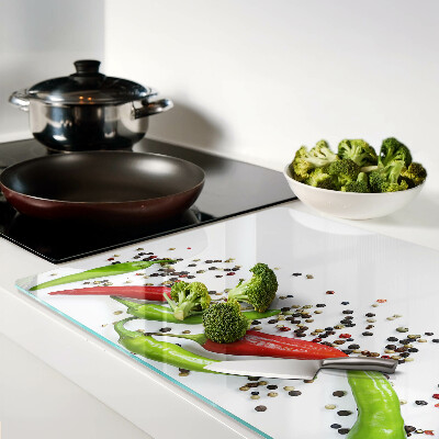 Schneidebrett glas Paprika und Pfeffer