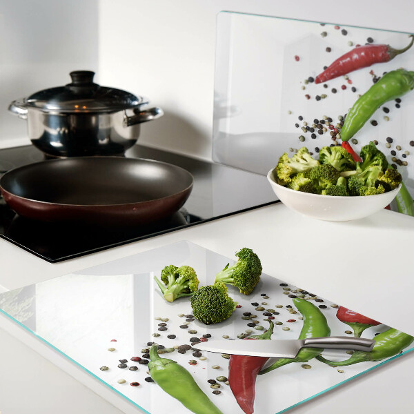 Schneidebrett glas Paprika und Pfeffer