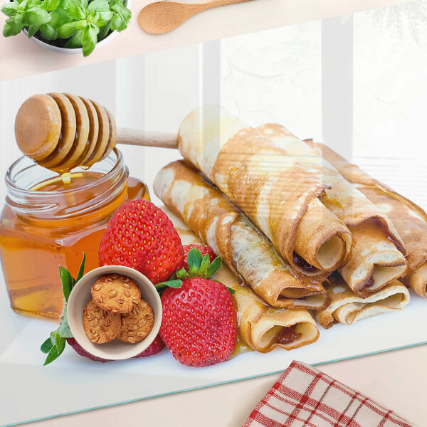 Glas Schneidebrett mit Motiv Pfannkuchen mit Honig und Erdbeeren