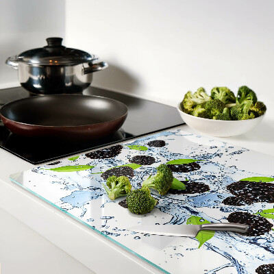 Glas schneidebrett Früchte im Wasser