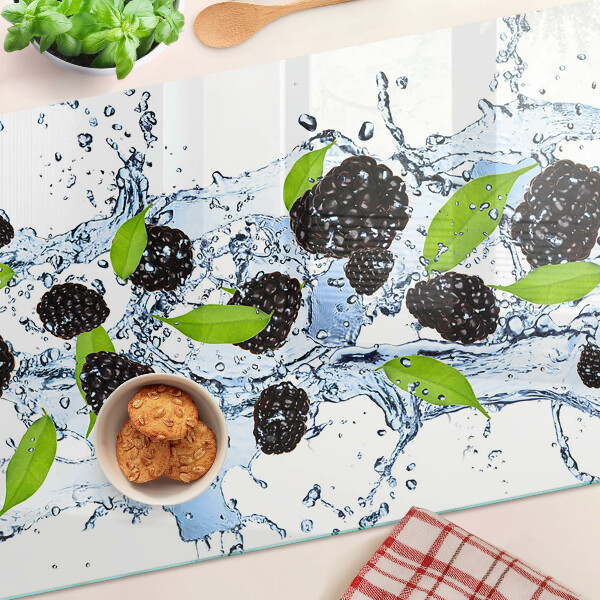 Glas schneidebrett Früchte im Wasser