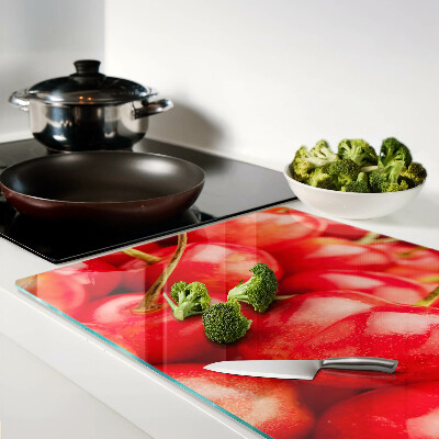 Schneidebrett mit Kirschmuster auf rotem Hintergrund