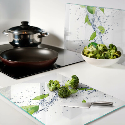 Schneidebrett glas Zitronen und Blattwasser