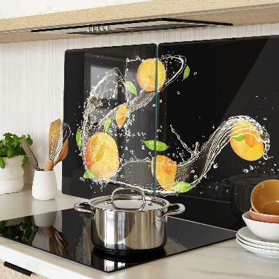 Glas-Schneidebrett mit Motiv aus Zitrusfrüchten im Wasser