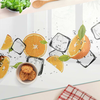 Schneidebrett mit Motiv aus Zitrusfrüchten und Eis