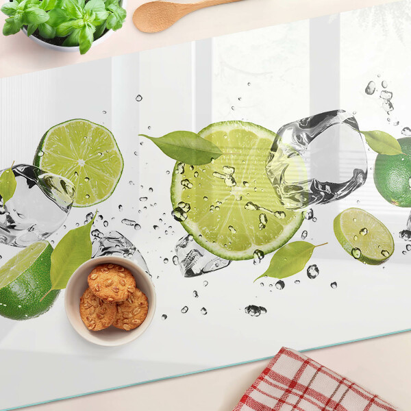 Schneidebrett Glas mit Motiv aus Zitronen und Eis im Wasser
