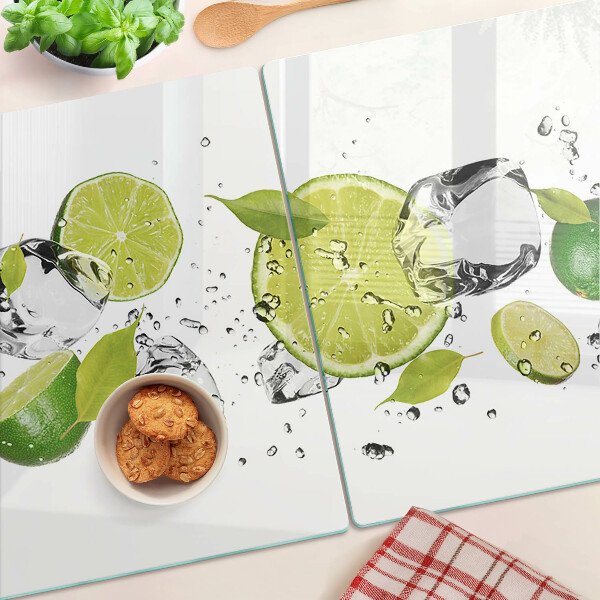 Schneidebrett Glas mit Motiv aus Zitronen und Eis im Wasser