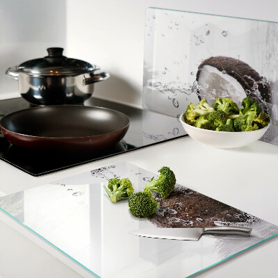 Schneidebrett glas Kokosnuss im Wasser