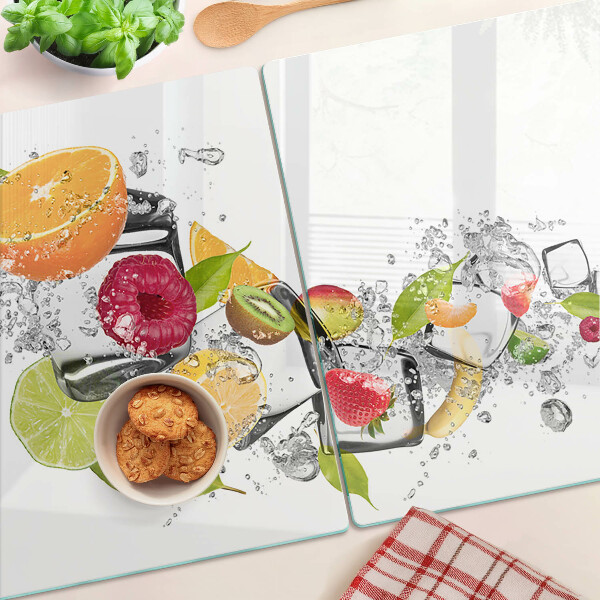 Glas schneidebrett Früchte im Wasser