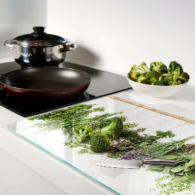 Schneidebrett Glas mit getrockneten Kräutern an einer Schnur