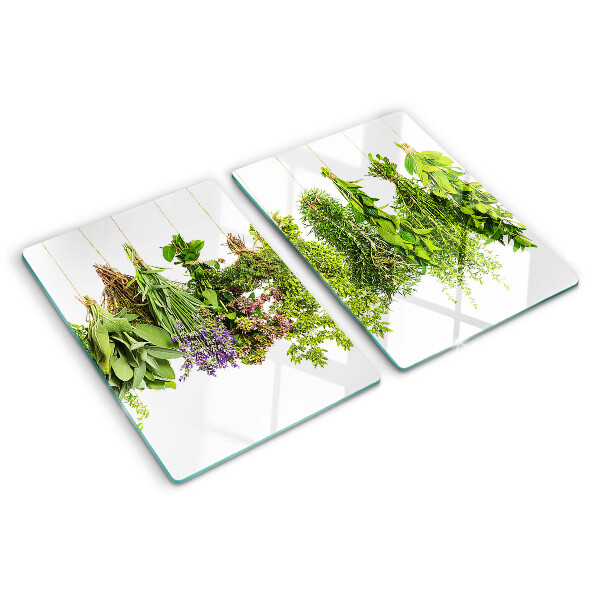 Glas schneidebrett Kräuter, die an einer Schnur hängen