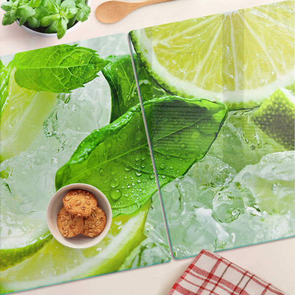 Schneidebrett glas Zitronen- und Minzblätter