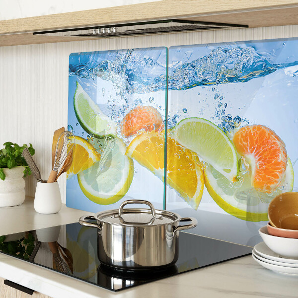 Glas-Schneidebrett mit Motiv von Zitrusfrüchten im Wasser