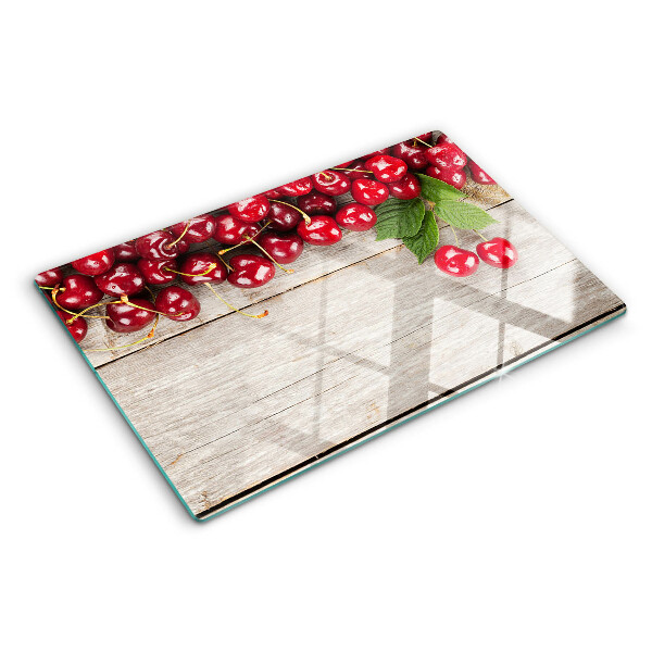 Glas schneidebrett Kirschen auf Holzgrund