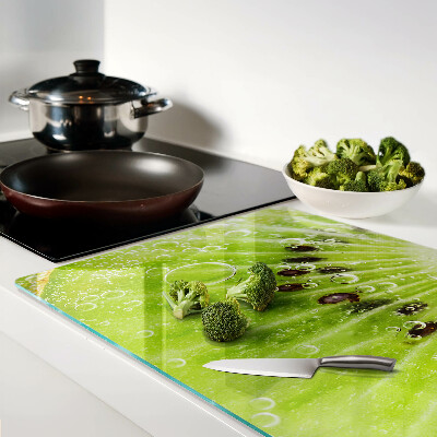 Glas schneidebrett Kiwi mit Wassertropfen