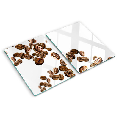 Schneidebrett glas Kaffeebohnen in Bewegung