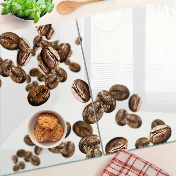 Schneidebrett glas Kaffeebohnen in Bewegung