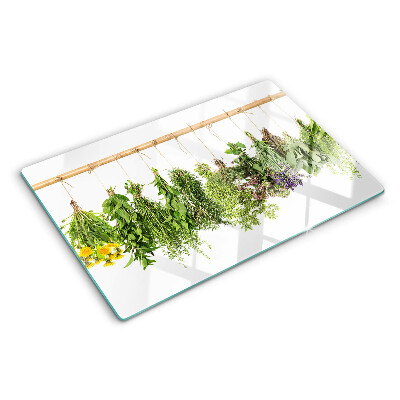 Schneidebrett Getrocknete Kräuter an einer Schnur