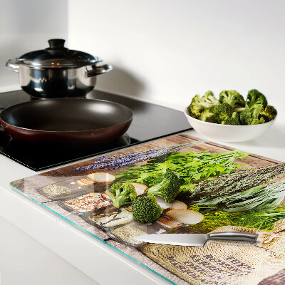 Glas-Schneidebrett mit Motiv Kräuter und Gewürze auf Holzgrund