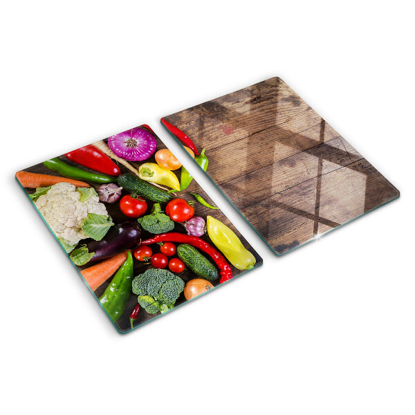 Glas schneidebrett Gemüse auf Holzgrund