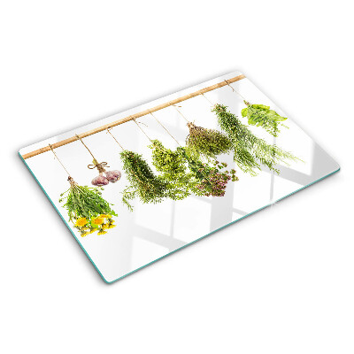 Schneidebrett mit Motiv hängender Kräuterbündel