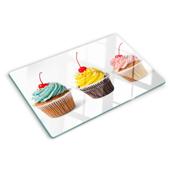 Glas schneidebrett Cupcake mit Schlagsahne und Kirsche
