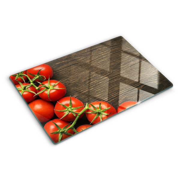 Schneidebrett mit Motiv von Tomaten auf Holzgrund