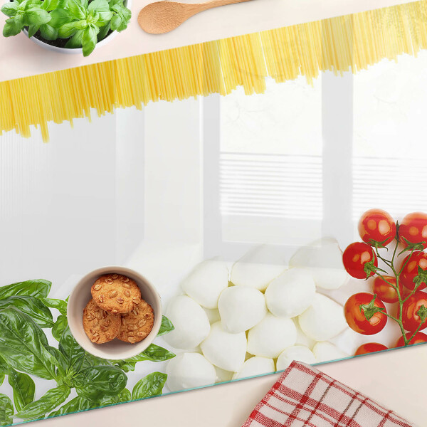 Glas Schneidebrett mit Pasta-Motiv mit Kräutern und Tomaten