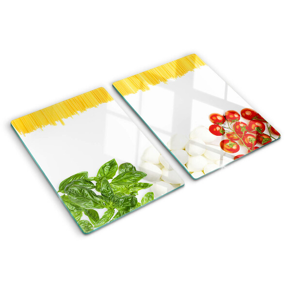 Glas schneidebrett Pasta mit Kräutern und Tomaten
