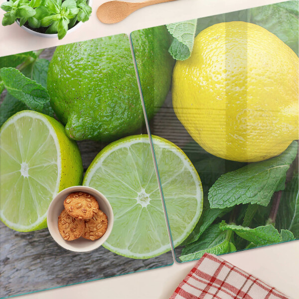 Schneidebrett glas Zitronen und Limetten mit Minze