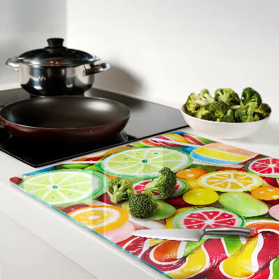 Glas schneidebrett Süßigkeiten und Früchte