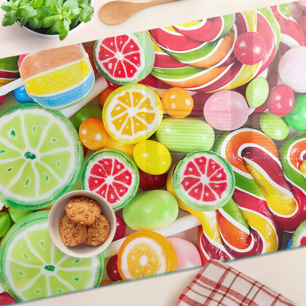 Glas schneidebrett Süßigkeiten und Früchte