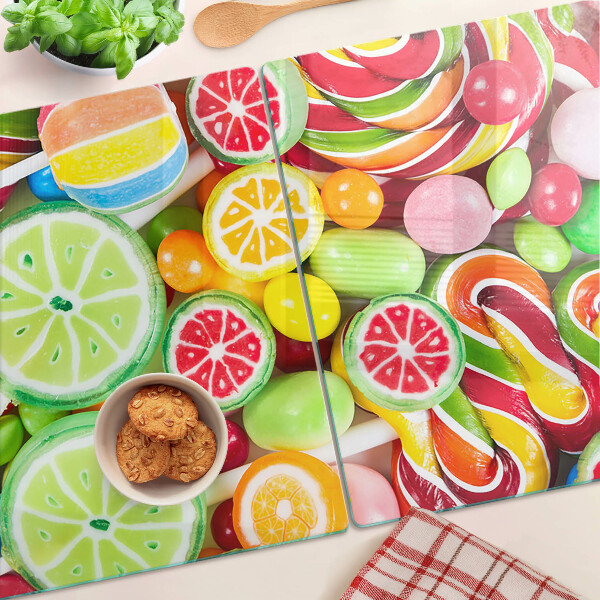 Glas schneidebrett Süßigkeiten und Früchte