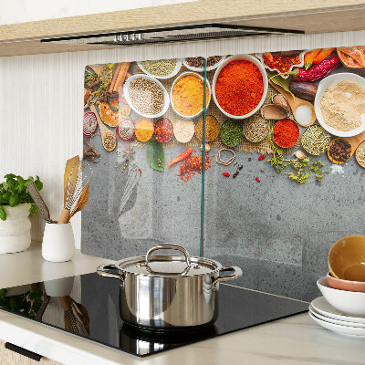 Glas-Schneidebrett mit Motiv aus Gewürzen und Kräutern