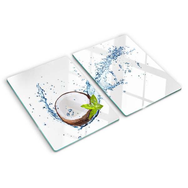 Glas schneidebrett Kokosnuss mit Wasser und Minze