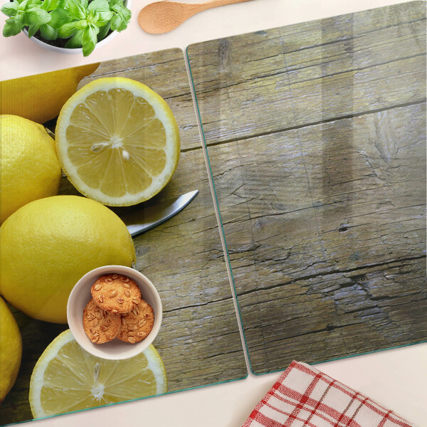 Schneidebrett mit Motiv aus Zitronen auf Holzgrund