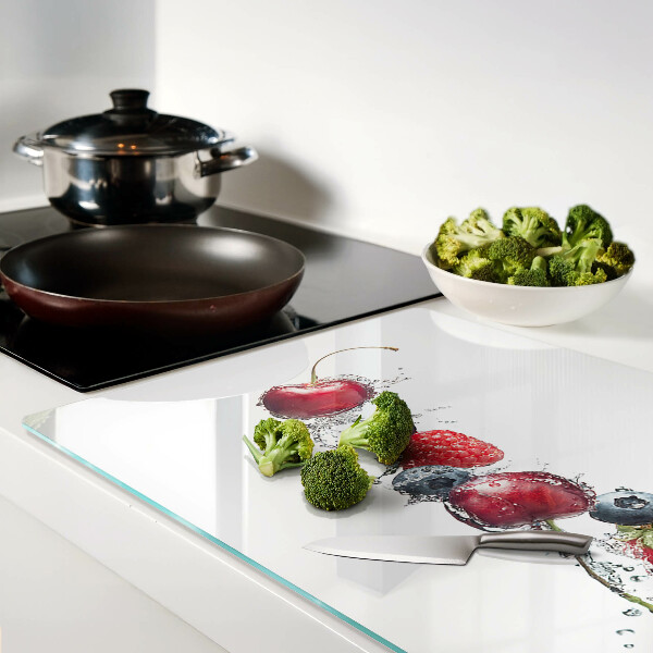 Schneidebrett mit Motiv von Früchten im Wasser