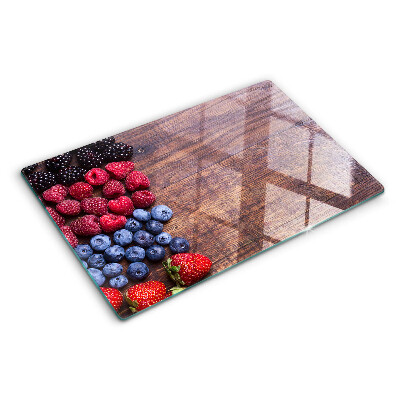 Schneidebrett glas Waldfrüchte auf Holzgrund